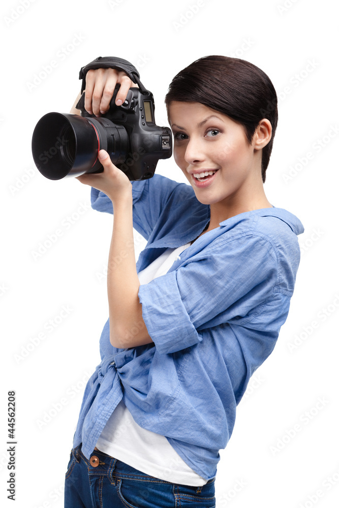 Lady takes photos holding photographic camera, isolated on white Lady takes photos holding photographic camera, isolated on white
