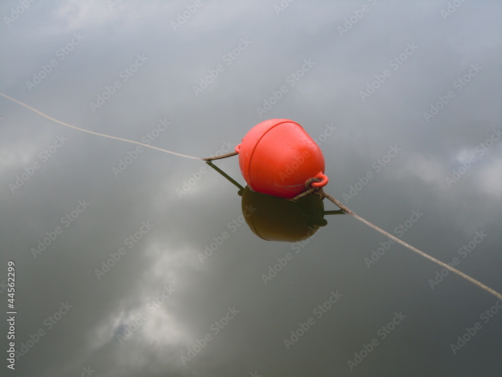 Floating ball buoy on water Floating ball buoy on water
