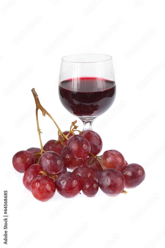 Glass of red wine with grapes Glass of red wine with grapes