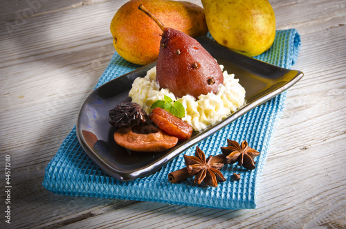 pear helene in red wine with spices photo