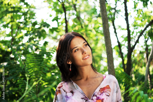 Beautiful woman in tropical forest