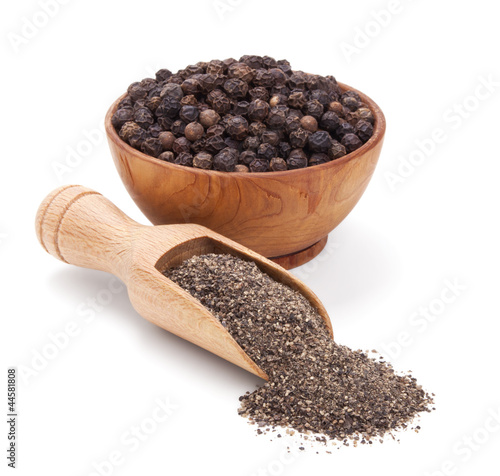 milled black pepper isolated on white