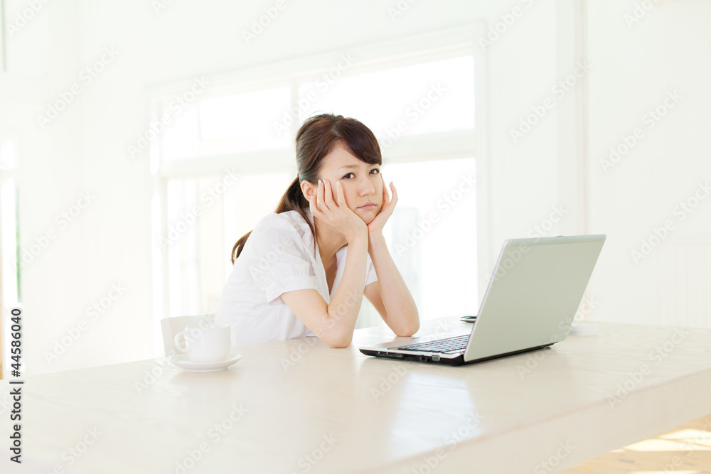 Beautiful business woman using a laptop computer. Portrait of as Beautiful business woman using a laptop computer. Portrait of as