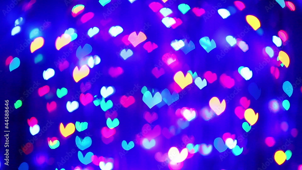 Abstract Valentine's day heart shaped blinking bokeh background Abstract Valentine's day heart shaped blinking bokeh background