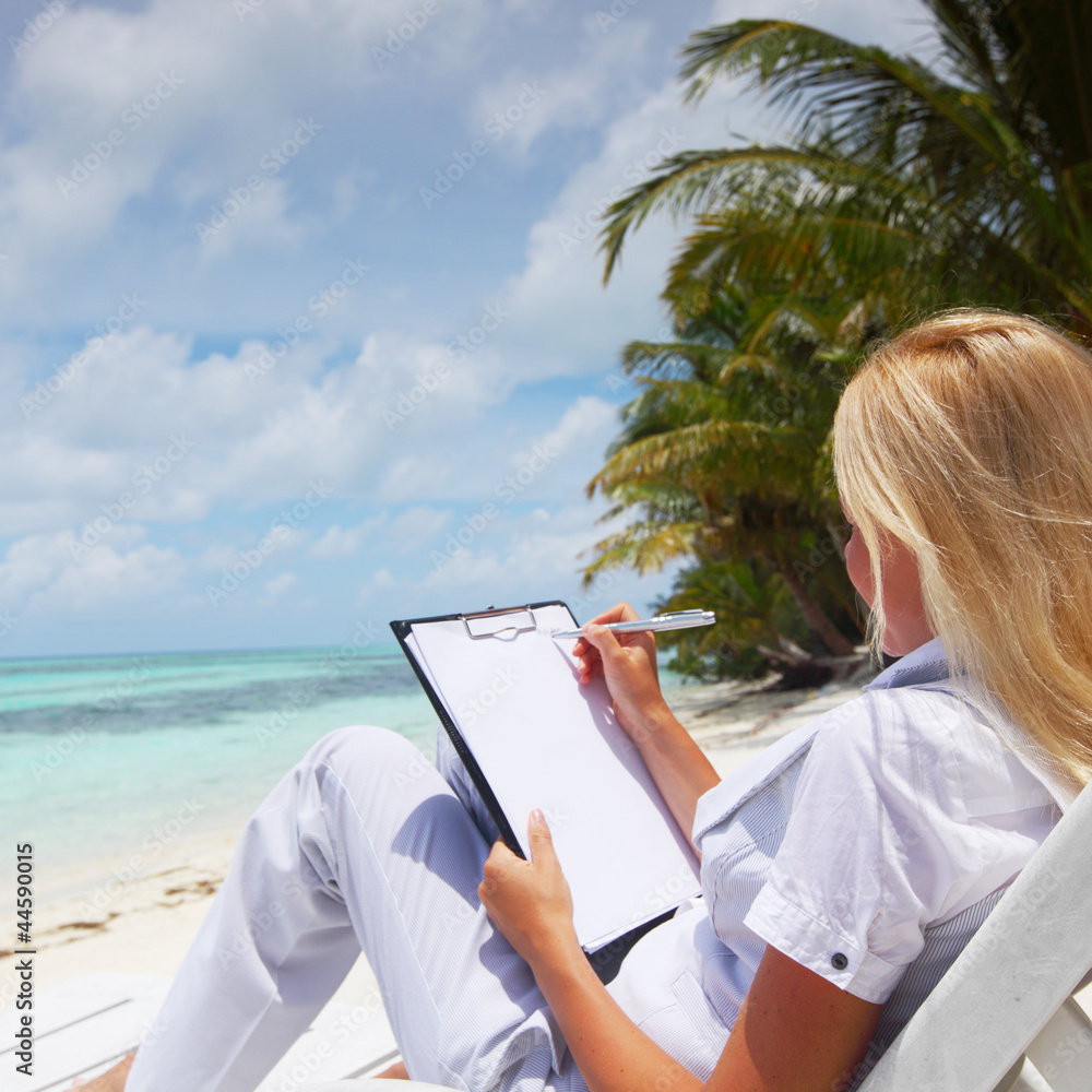 tropical business woman with blank paper