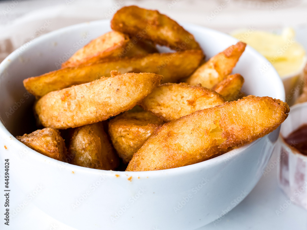 Golden French fries potatoes ready to be eaten Golden French fries potatoes ready to be eaten