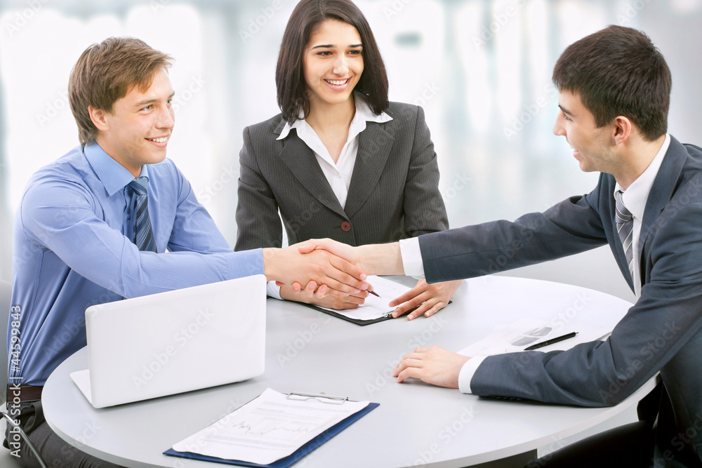 Business people shaking hands Business people shaking hands