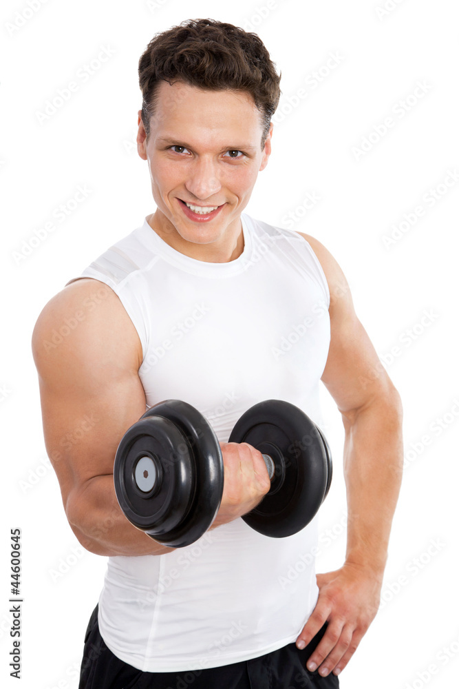 Satisfied young strength man lifting dumbbell Satisfied young strength man lifting dumbbell
