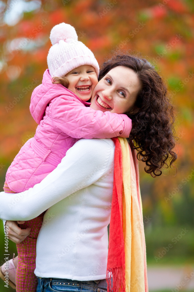 Mother with daughter in autumn Mother with daughter in autumn