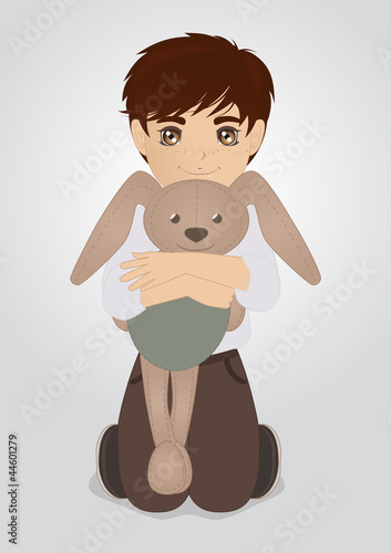 Little boy and plush rabbit