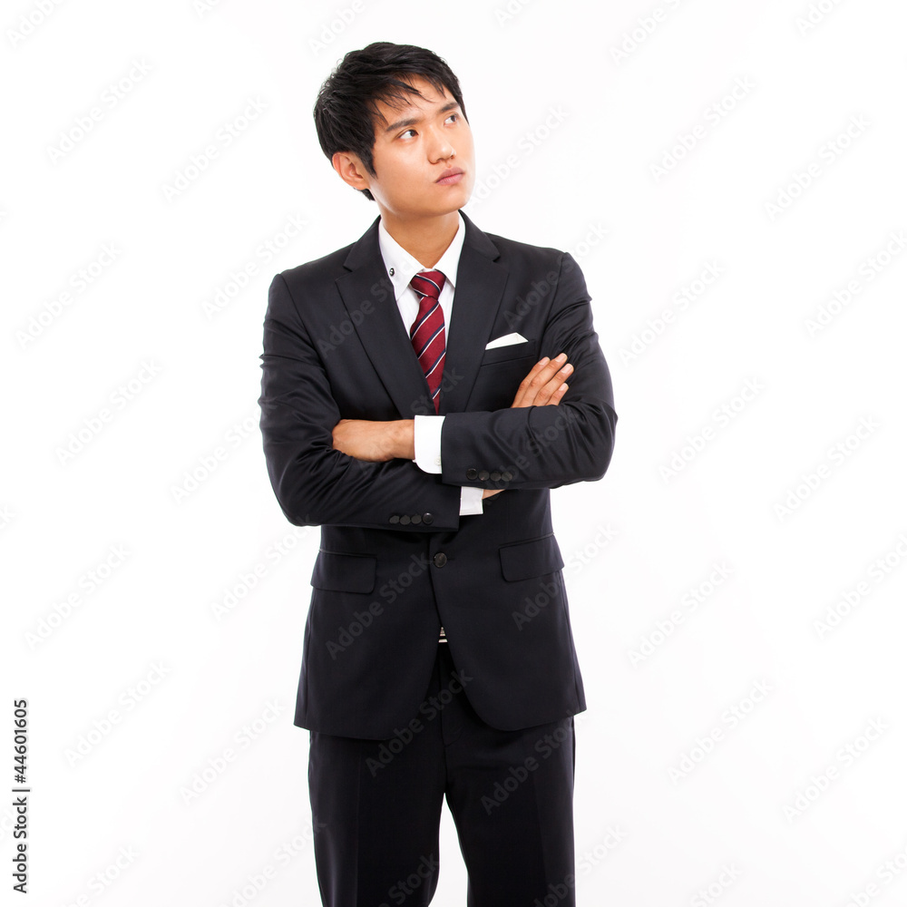Looking up Asian business man isolated on white background. Looking up Asian business man isolated on white background.