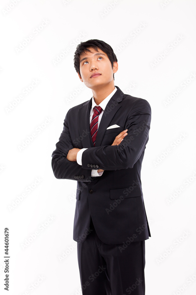 Looking up Asian business man isolated on white background. Looking up Asian business man isolated on white background.