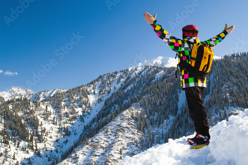 Sport man in snowy mountains