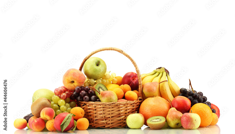 Assortment of exotic fruits in basket isolated on white Assortment of exotic fruits in basket isolated on white