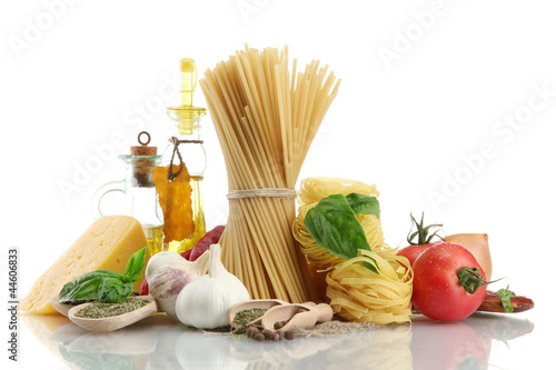 Pasta spaghetti, vegetables, spices and oil, isolated on white