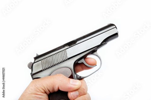 Gun in hand on a white background.