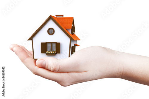 Hand holding / offer house. Real estate concept