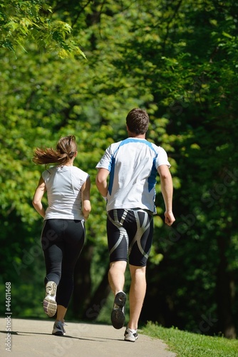 Young couple jogging at morning