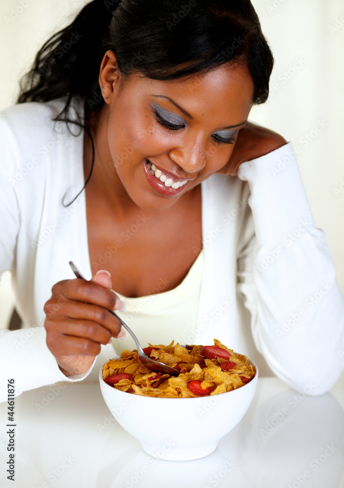 Lovely young woman having healthy breakfast Lovely young woman having healthy breakfast