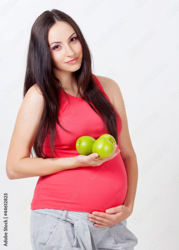 Pregnant woman with apple Pregnant woman with apple