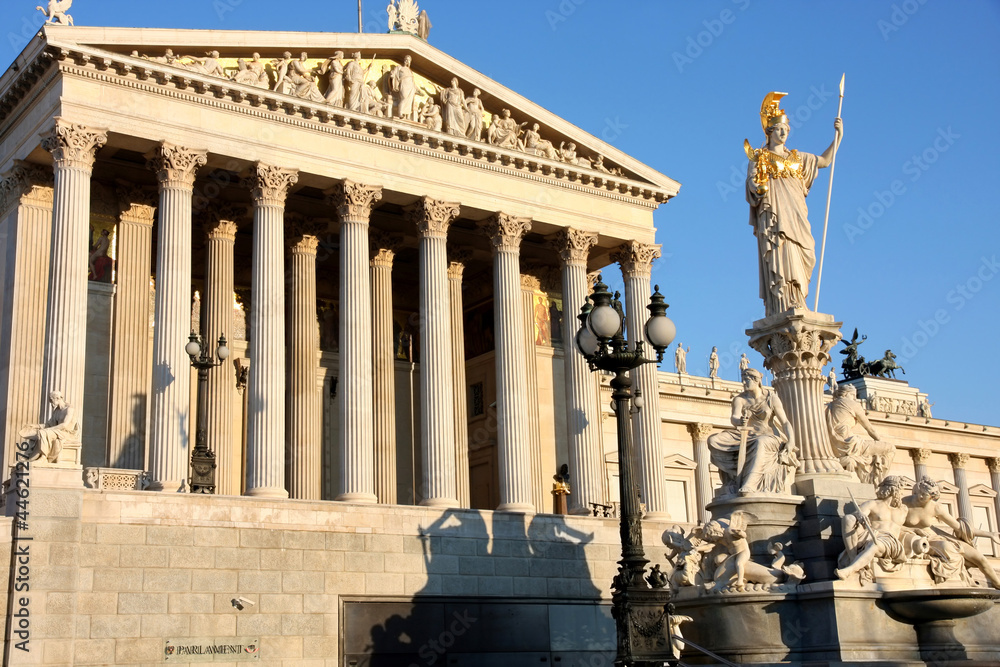 Fototapeta premium The Austrian Parliament and Athena Fountain in Vienna, Austria