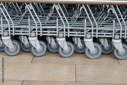 wheels of shopping trolleys in a row