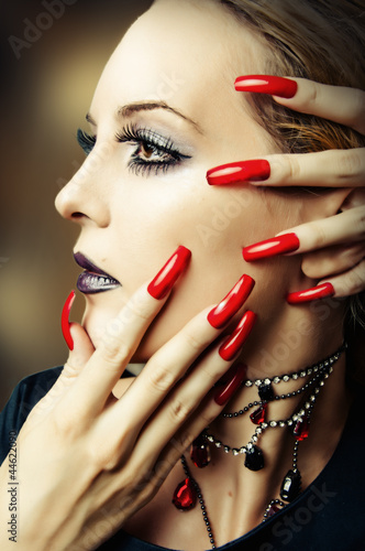 Obraz na plátne fashion make up and long red nails
