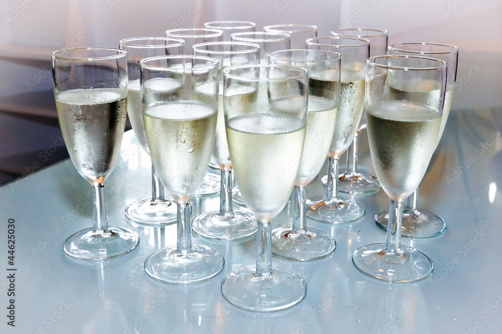 Glasses with champagne on the party table