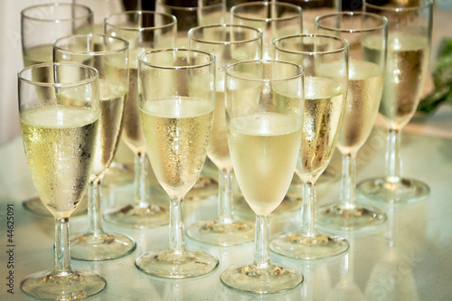 Glasses with champagne on the party table