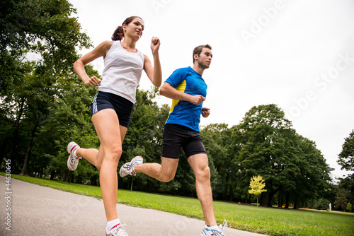Fototapet Jogging together - sport young couple