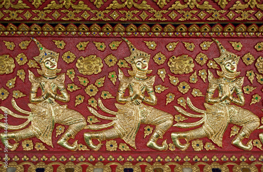 Thai style gloden deva carving on wood