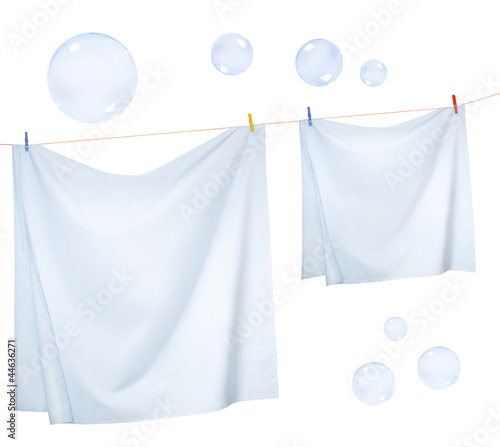 Linen sheets drying on a rope and Soap bubbles