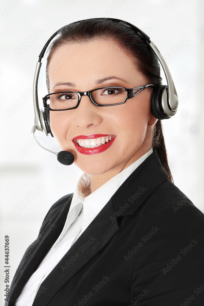 Smiling young woman with headset and microphone. Smiling young woman with headset and microphone.