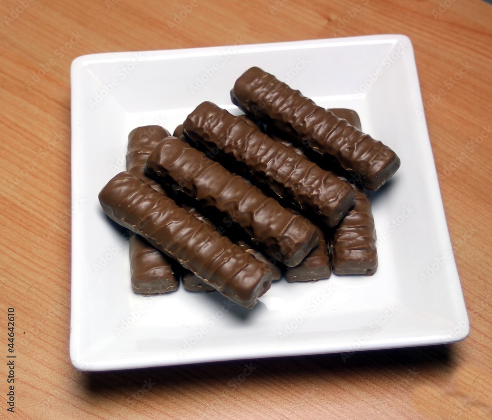 Ceramic plate with chocolate fingers Ceramic plate with chocolate fingers