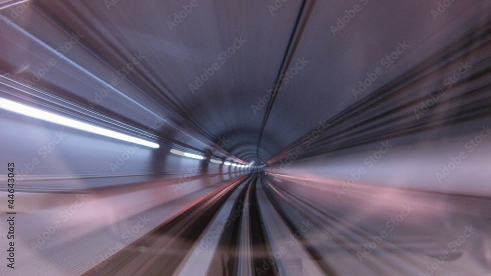 Train in subway moves from station to station Train in subway moves from station to station