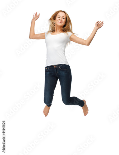 jumping teenage girl in blank white t-shirt
