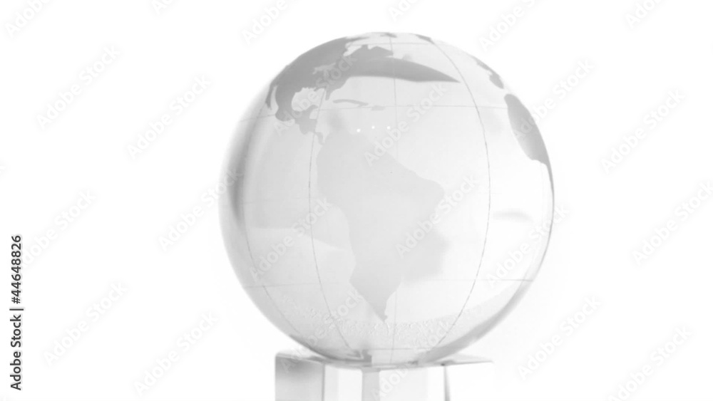 Transparent box and sphere with world map on it spin