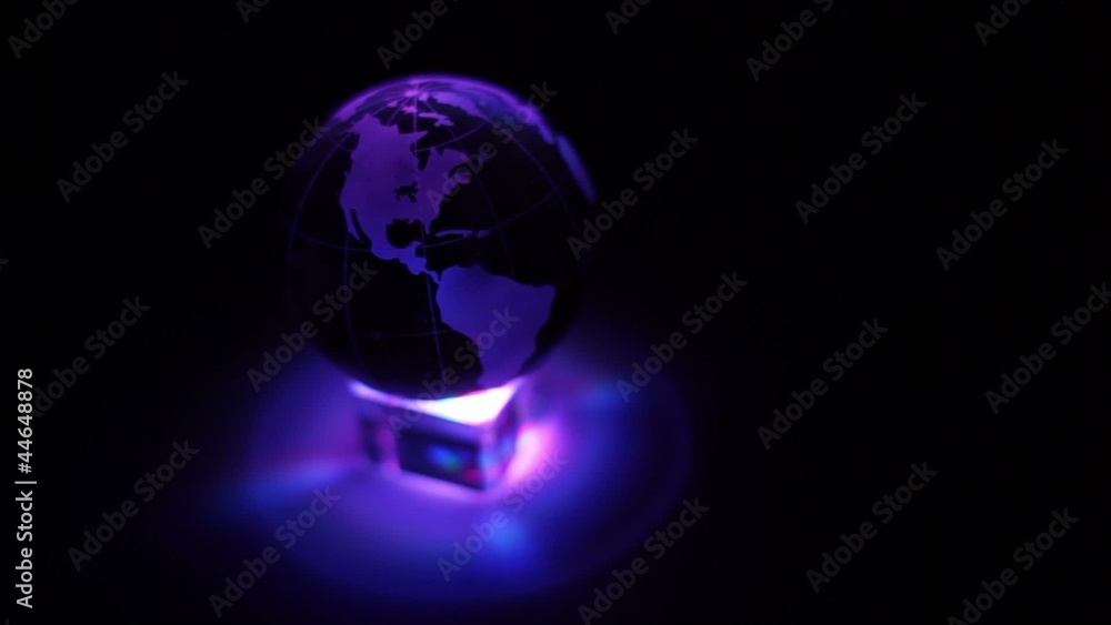 Glass Earth sphere with color illumination Glass Earth sphere with color illumination