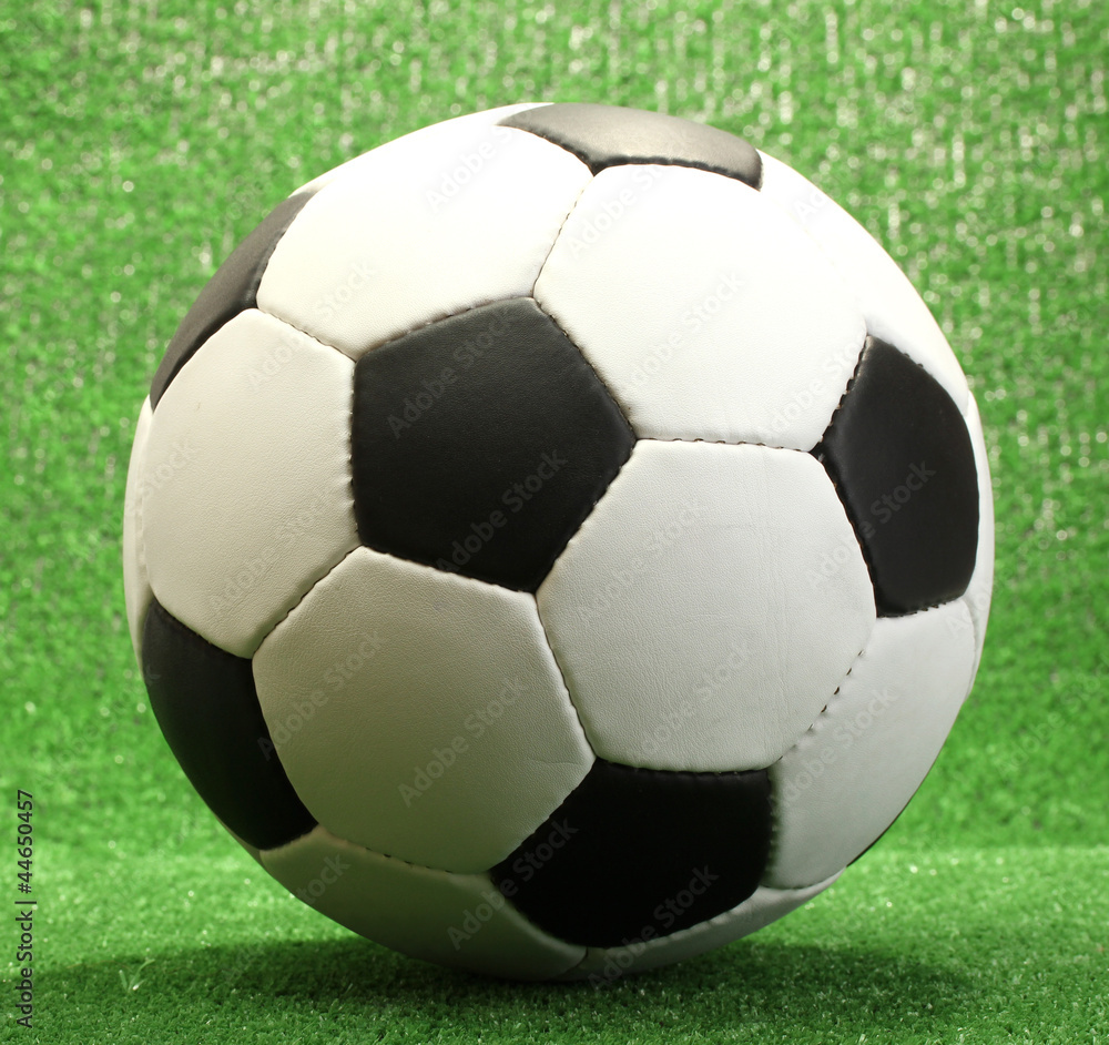 football ball on artificial green grass football ball on artificial green grass
