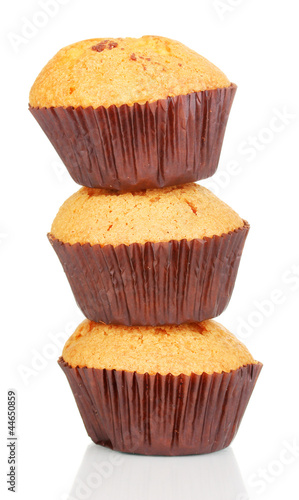 Fresh muffins isolated on white