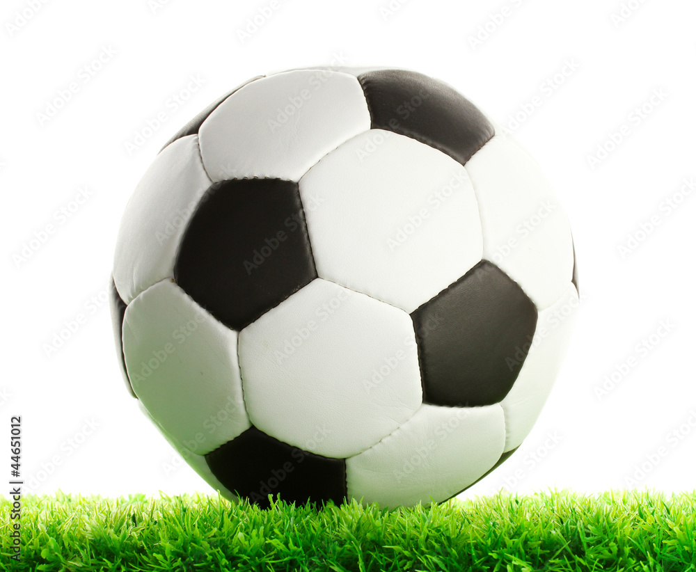 football ball on green grass, isolated on white