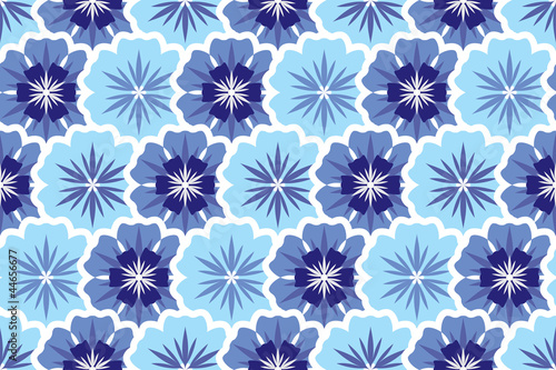seamless background from violet flowers. Light and dark petals