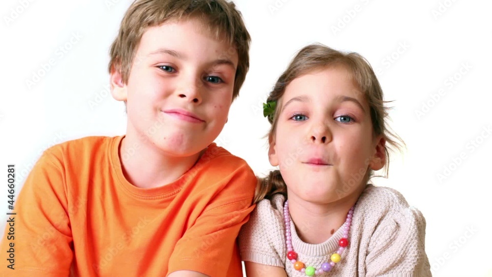 Two kids boy and girl smile isolated Two kids boy and girl smile isolated