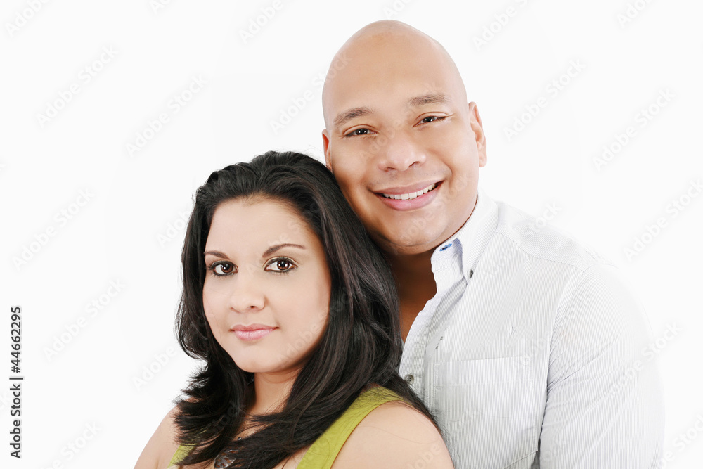 Closeup portrait of a sweet happy young couple smiling together. Closeup portrait of a sweet happy young couple smiling together.