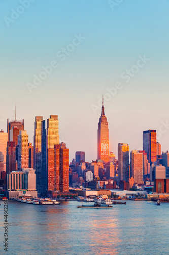 Manhattan at sunset © sborisov