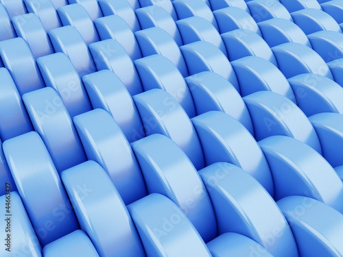 Abstract blue background made of shining plastic cylinder