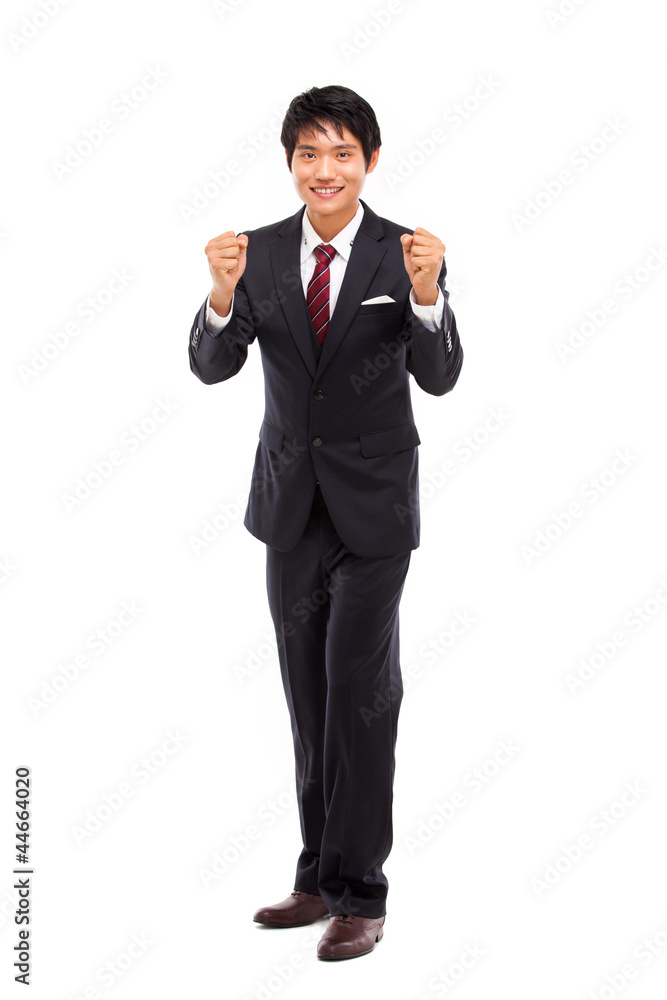 Showing fist young Asian business man. Showing fist young Asian business man.