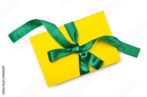 Envelope with colourful ribbon on white