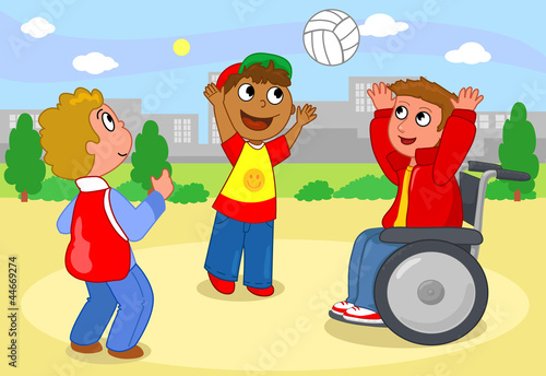 Two children playing volleyball with a boy on wheelchair.