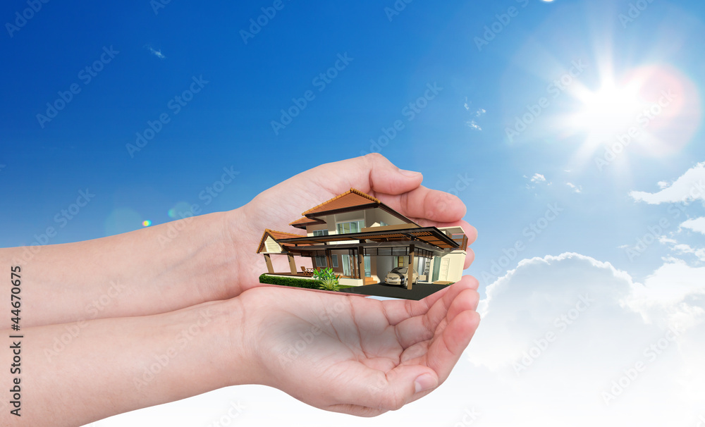 Fototapeta premium Hand holding new house